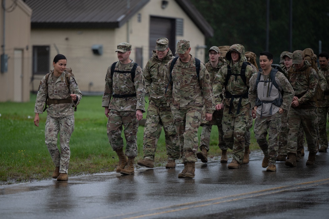 Eielson Air Force Base leadership march in the 11th Annual Explosive Ordinance Disposal Memorial Ruck at Eielson AFB, Alaska, Sept. 5, 2025.