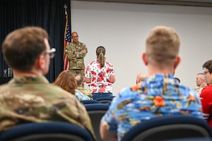 military member speaks to a person