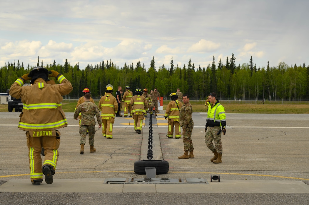 U.S. Air Force Airmen from the 354th Civil Engineering Squadron reset an Aircraft Arresting System cable after an annual maintenance test at Eielson Air Force Base, Alaska, May 29, 2025.