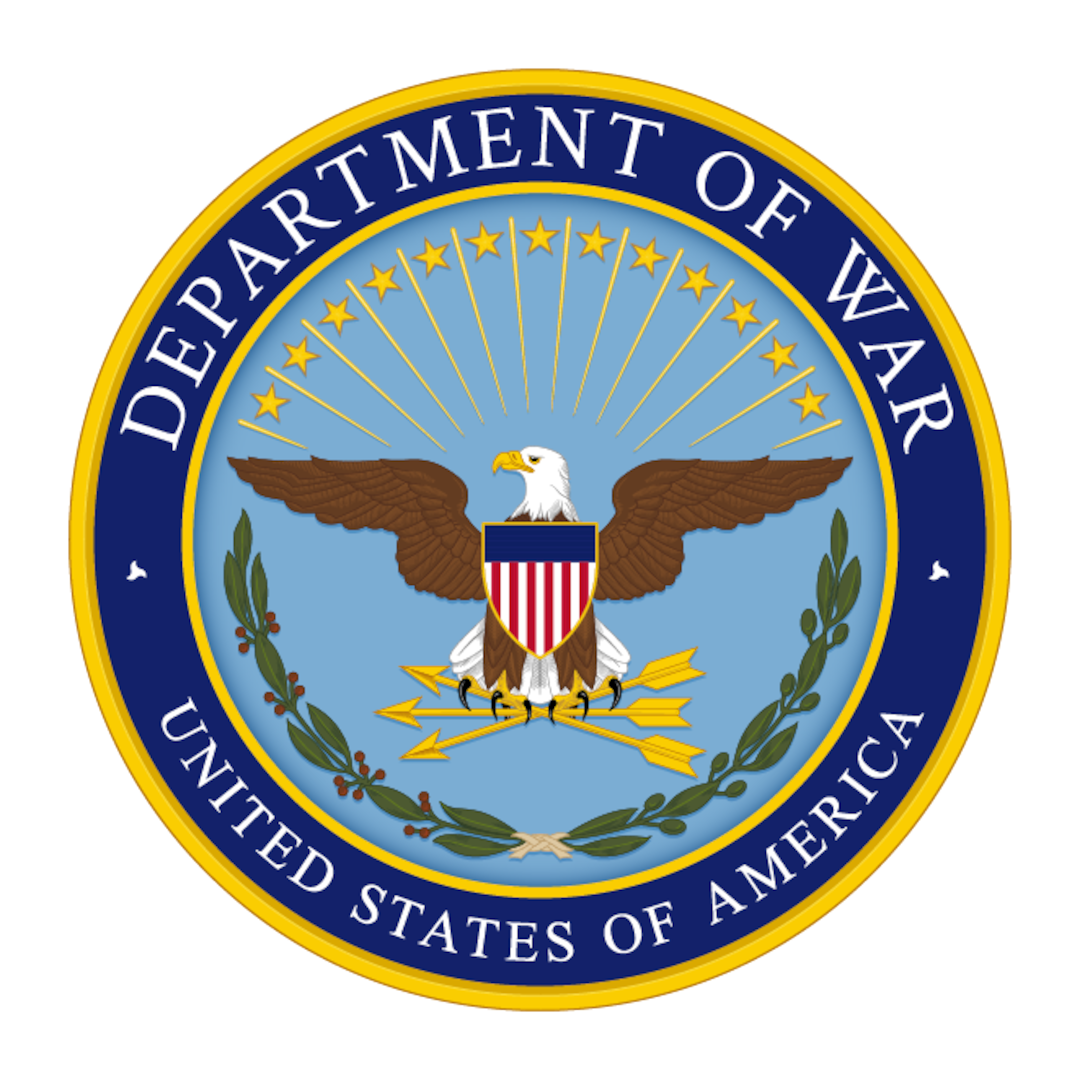 A seal showing an eagle with its wings spread out. It has a red, white and blue shield on its chest, and it is clutching three arrows. The seal reads “Department of War – United States of America.”