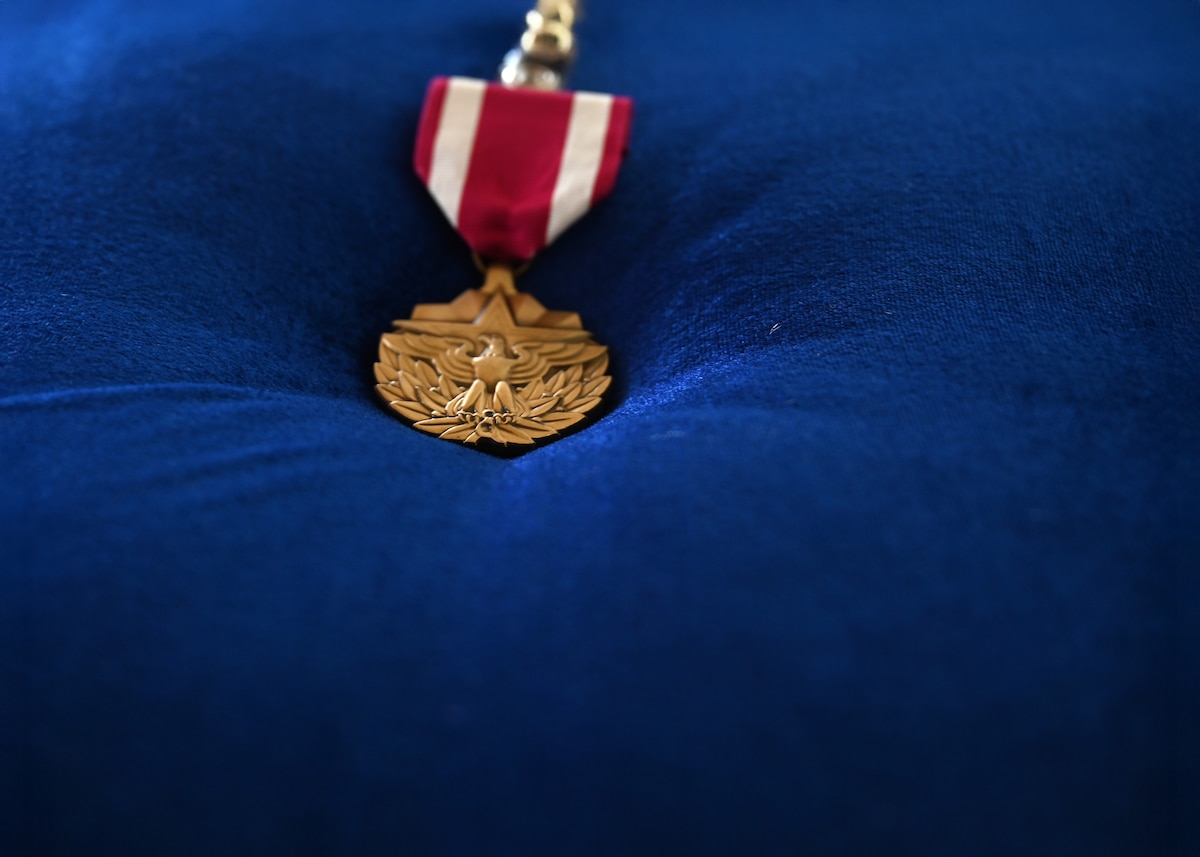 The Meritorious Service Medal is at Davis-Monthan Air Force Base, Arizona, Sept. 4, 2025. The medal was presented to Brazilian Air Force Col. Leonardo Macedo, foreign liaison officer, for his service to the United States Air Force at Air Forces Southern. (U.S. Air Force photo by Staff Sgt. Abbey Rieves)
