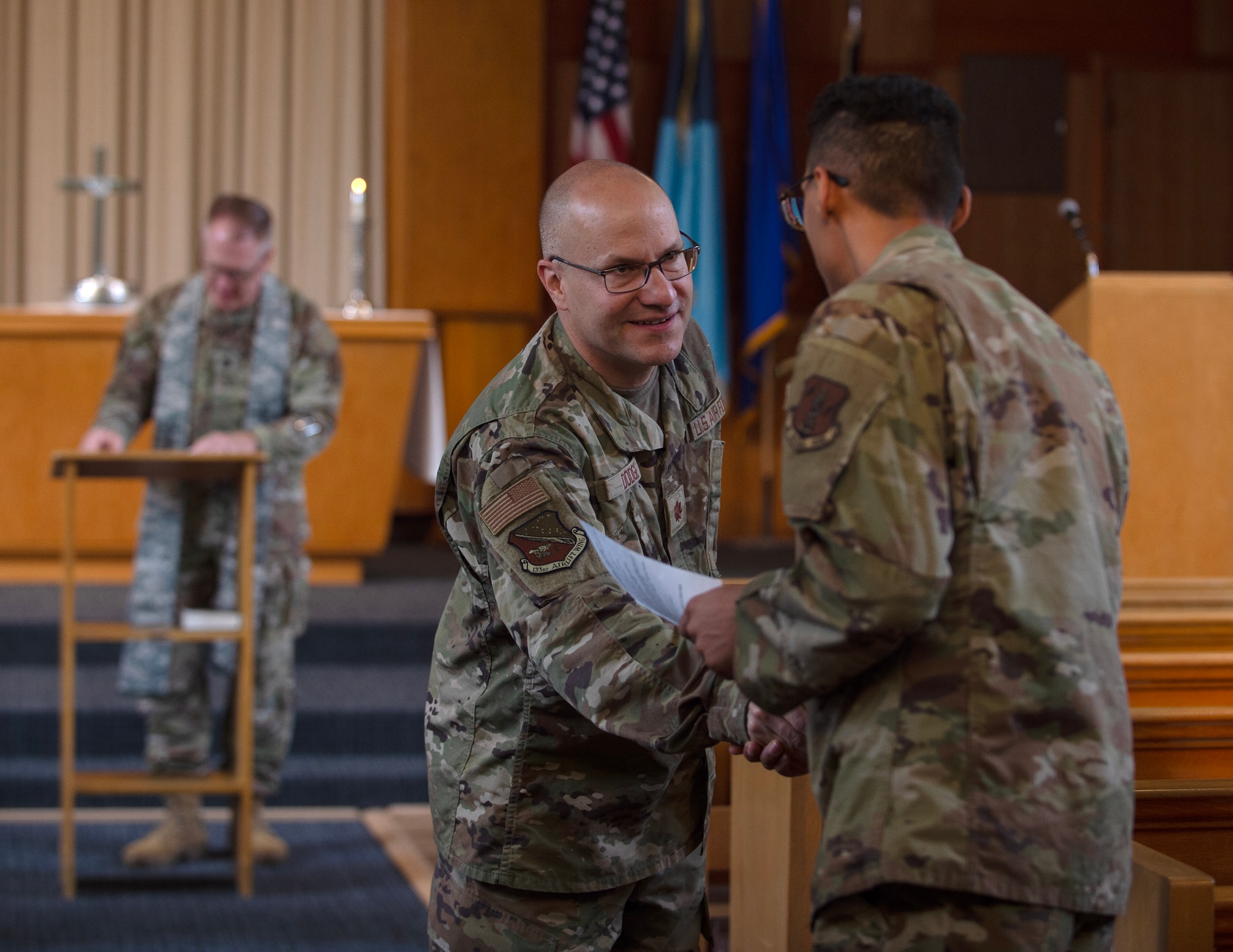 U.S. Air Force Ch. (Lt. Col.) Cory Germain gives a protestant service in St. Paul, Minn., Aug. 8, 2025.