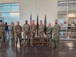 Members of the Army Space Support Team 12, 117th Space Battalion stand for a group photo during a deployment ceremony at the 117th Space Battalion Headquarters, Fort Carson, June 8, 2025. The team deployed in support of Operation Spartan Shield. (U.S. Army National Guard courtesy photo of 117th Space Battalion)