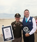 U.S. Army Corps of Engineers (USACE) Galveston District (SWG) Commander Col. David Dake [left] poses for a photo with Guinness World Records Spokesperson Michael Empric at the Galveston Seawall after an event observing the 125th anniversary of the Great Galveston Hurricane of 1900, September 6, 2025.

Empric officially recognized the Galveston Seawall as the world’s longest walkway, at 10 miles and 1,584 feet.