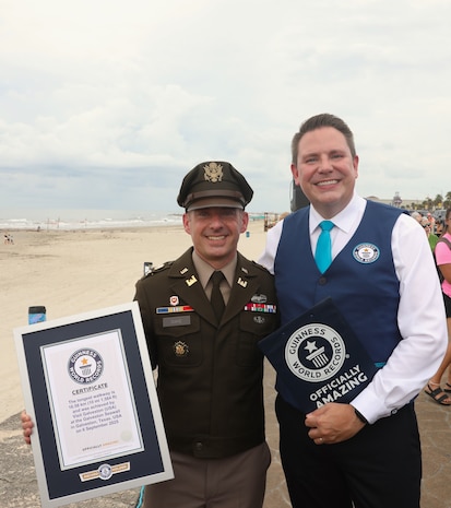 U.S. Army Corps of Engineers (USACE) Galveston District (SWG) Commander Col. David Dake [left] poses for a photo with Guinness World Records Spokesperson Michael Empric at the Galveston Seawall after an event observing the 125th anniversary of the Great Galveston Hurricane of 1900, September 6, 2025.

Empric officially recognized the Galveston Seawall as the world’s longest walkway, at 10 miles and 1,584 feet.