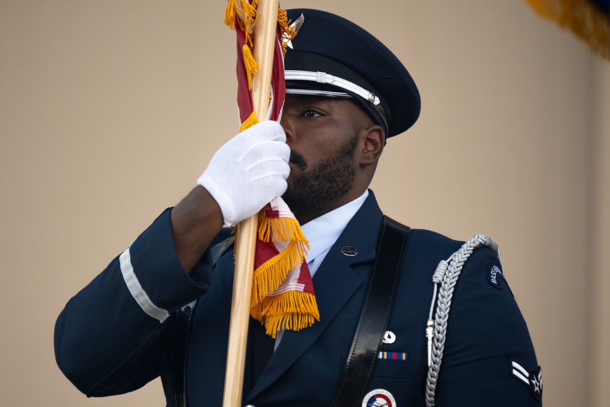 U.S. Air Force Airman 1st Class Christien Poole, Steel Talons honor guardsman, presents the colors before the 3rd annual Ace of Races Marathon at Holloman Air Force Base, New Mexico, Sept. 6, 2025. The Ace of Races Marathon was combined with the biennial Community Connections Day to maximize the opportunities for the local and national community to visit the base and learn about the various ways Team Holloman supports national defense. (U.S. Air Force photo by Tech. Sgt. Victor J. Caputo)