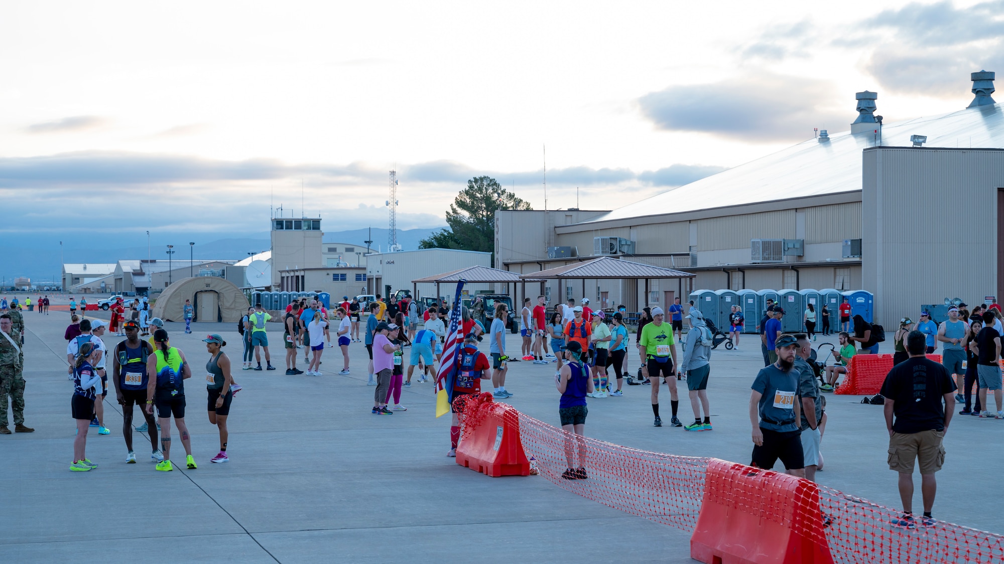 Racers, alongside their family and friends, prepare for the start of the 3rd annual Ace of Races Marathon at Holloman Air Force Base, New Mexico, Sept. 6, 2025. Nearly 500 people from across the country signed up for the race, which consisted of a full and half marathon, a 5K and a 1-mile kids' dash. (U.S. Air Force photo by Tech. Sgt. Victor J. Caputo)