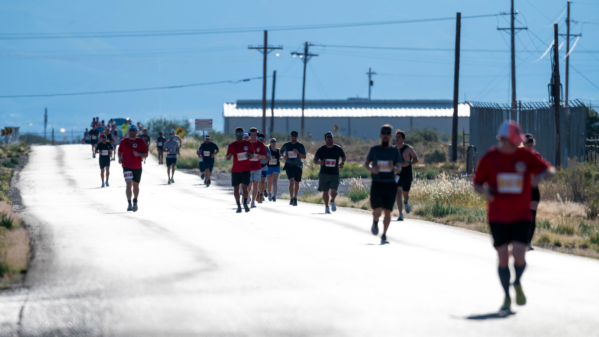 Racers participate in the 3rd annual Ace of Races Marathon at Holloman Air Force Base, New Mexico, Sept. 6, 2025. Nearly 500 people from across the country signed up for the race, which consisted of a full and half marathon, a 5K and a 1-mile kids' dash. (U.S. Air Force photo by Tech. Sgt. Victor J. Caputo)