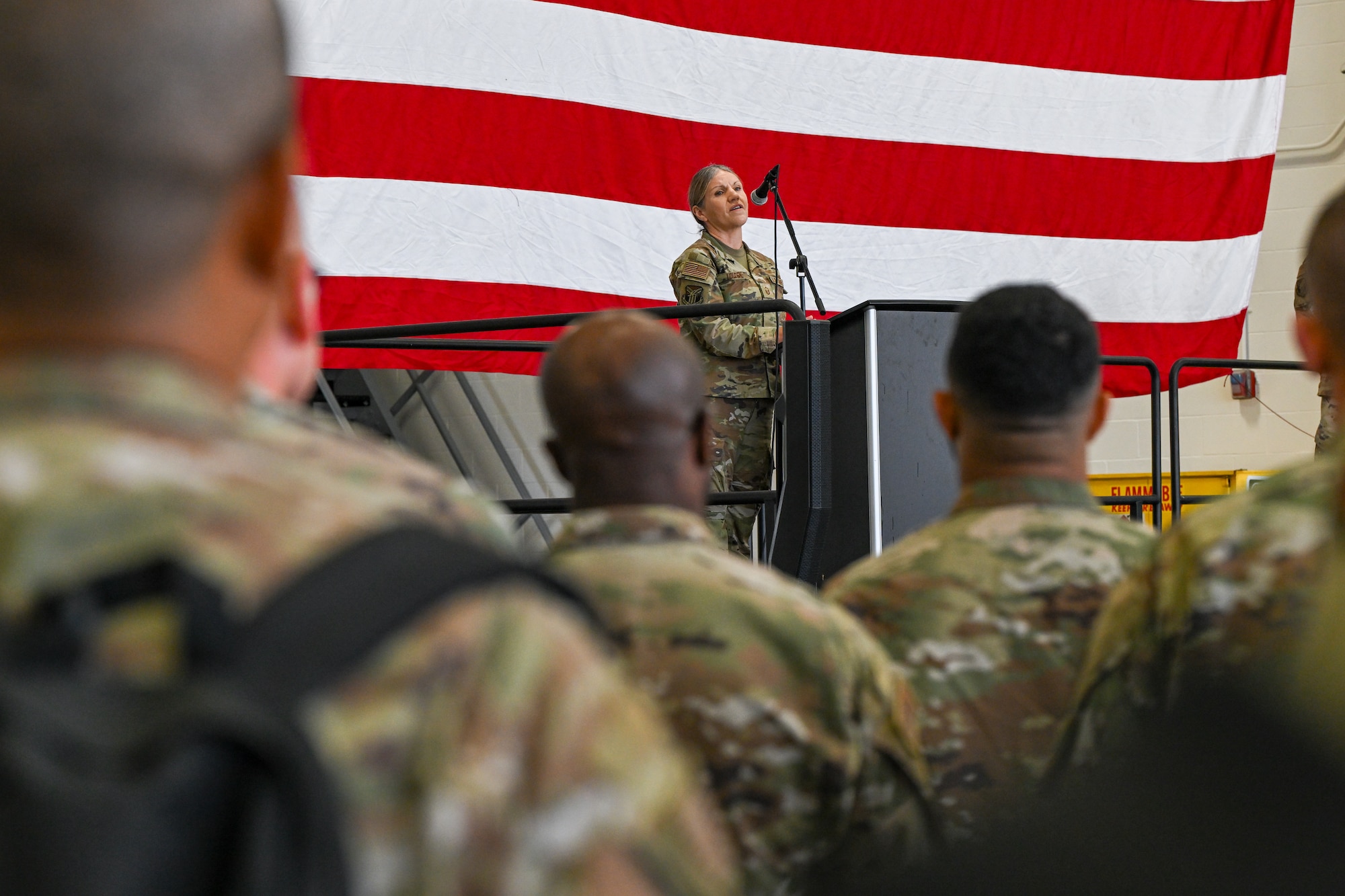 Master Sgt. Juliet Louden, the Yellow Ribbon representative with the 910th Airlift Wing, speaks to Reserve Airmen, Sept. 6, 2025, during a commander’s call at Youngstown Air Reserve Station, Ohio.