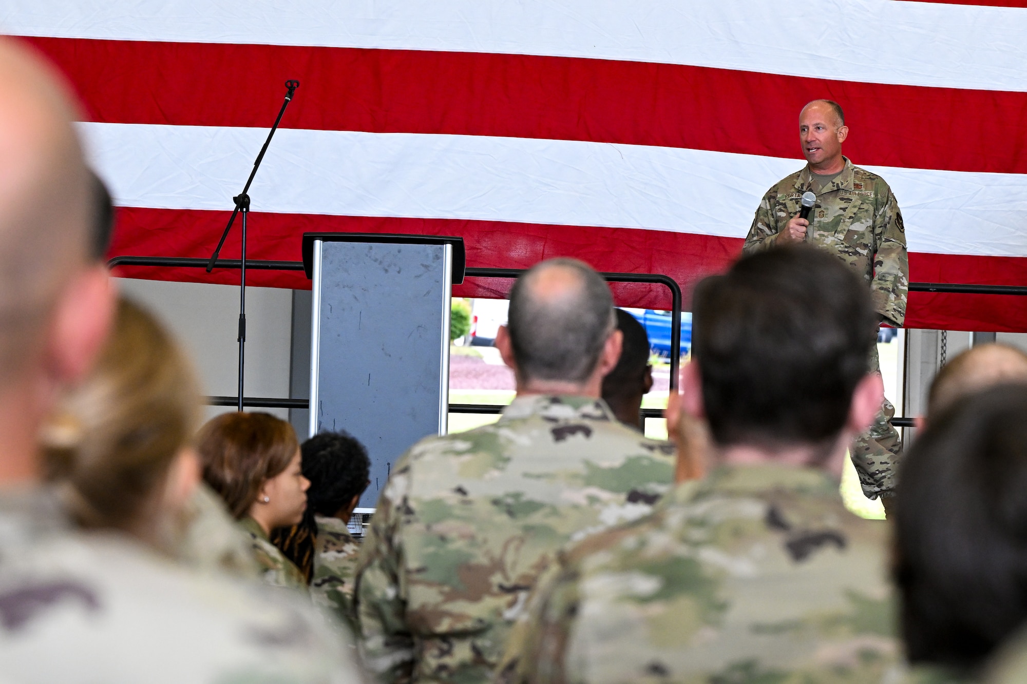 Chief Master Sgt. Dan Porta, the 910th Maintenance Group command chief, speaks to Reserve Airmen, Sept. 6, 2025, during a commander’s call at Youngstown Air Reserve Station, Ohio.