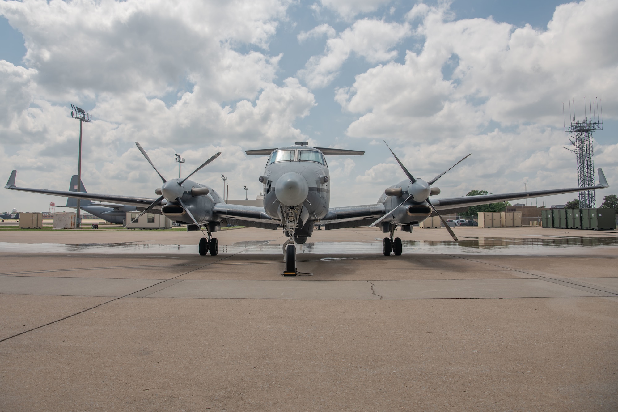 an aircraft waits on a flightline