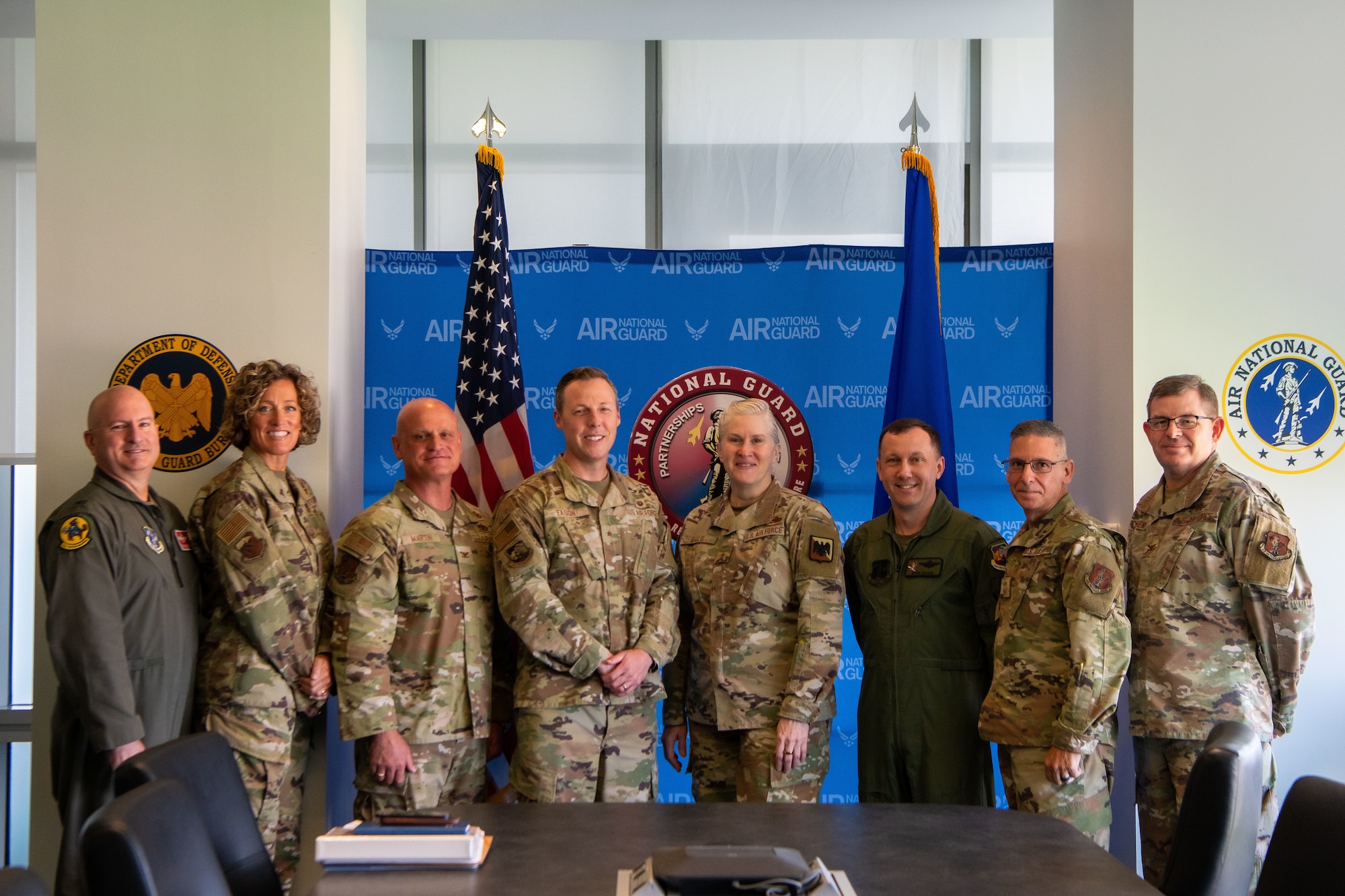 Uniformed members pose for a photo
