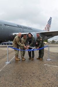(Left to Right) Brig. Gen. William Davis, commander of the New Hampshire Air National Guard, Maj. Gen. David Mikolaities, the adjutant general of the New Hampshire National Guard, Col. Daniel Wittmer, commander of the Air National Guard Air Force Reserve Command Test Center, and Col. Nelson Perron, commander of the 157th Air Refueling Wing, cut the ribbon during a ceremony establishing the new KC-46A Combined Test Force at Pease Air National Guard Base, New Hampshire, September 5, 2025.  The milestone establishes the 157th ARW and AATC as key players in testing and fielding advanced capabilities for the KC-46A. (U.S. Air National Guard photo by Senior Master Sgt. Timm Huffman)