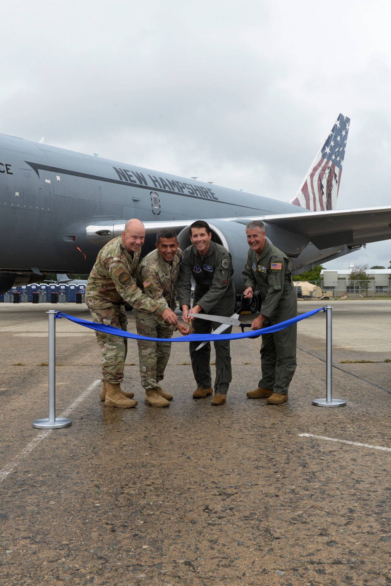 (Left to Right) Brig. Gen. William Davis, commander of the New Hampshire Air National Guard, Maj. Gen. David Mikolaities, the adjutant general of the New Hampshire National Guard, Col. Daniel Wittmer, commander of the Air National Guard Air Force Reserve Command Test Center, and Col. Nelson Perron, commander of the 157th Air Refueling Wing, cut the ribbon during a ceremony establishing the new KC-46A Combined Test Force at Pease Air National Guard Base, New Hampshire, September 5, 2025.  The milestone establishes the 157th ARW and AATC as key players in testing and fielding advanced capabilities for the KC-46A. (U.S. Air National Guard photo by Senior Master Sgt. Timm Huffman)