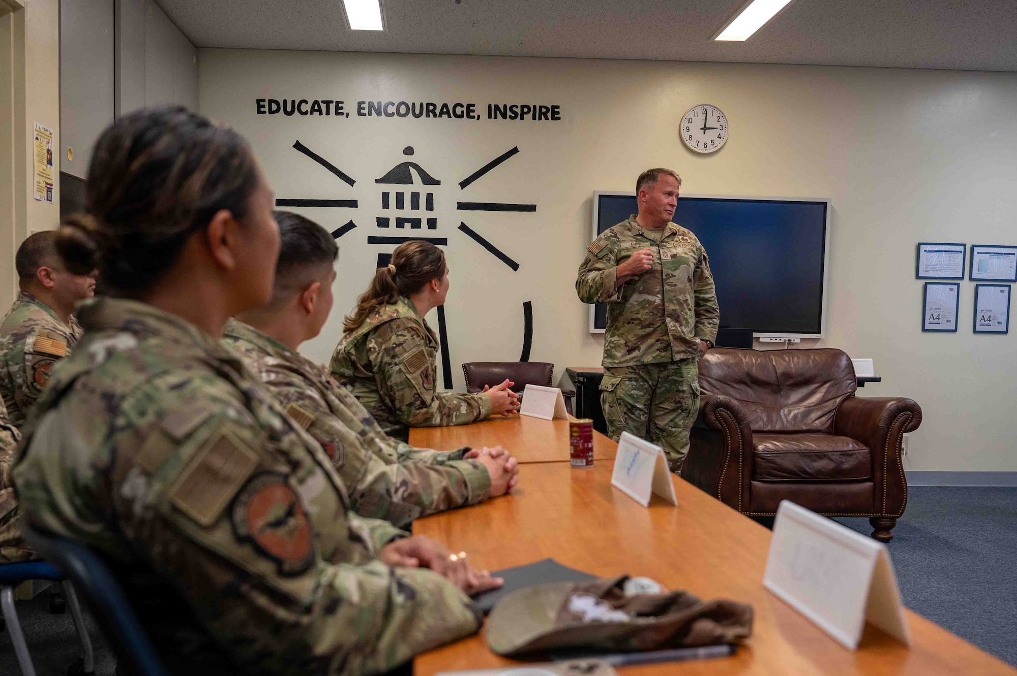 military member speaks to classroom