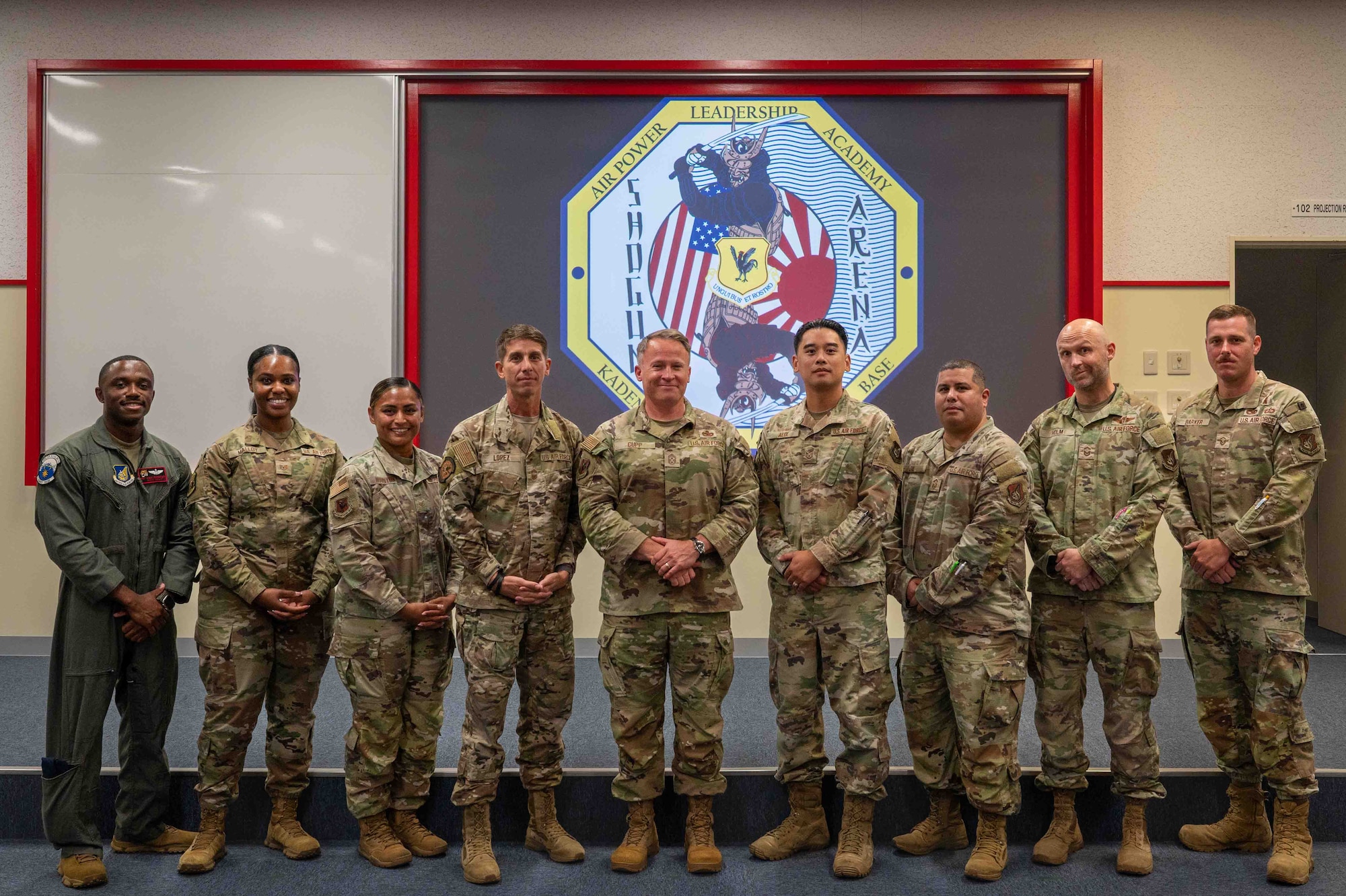 military members pose for a photo