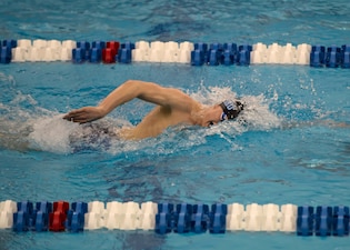 Lieutenant Andrew Greenhalgh, a second-year psychiatry resident with Navy Medicine Readiness and Training Command Camp Lejeune, swims laps while training for the upcoming Armed Forces National Triathlon Championships in San Diego, September 10-14, 2025.