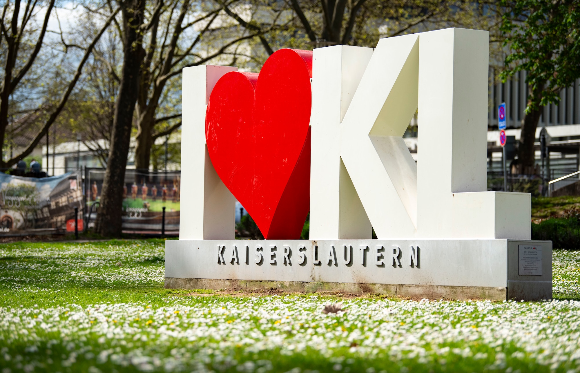 The "I Love KL" sculpture is surrounded by flowers in Kaiserslautern, Germany, April 10, 2024. This symbol of love and pride in the village provides a picturesque photo opportunity in front of the Pfalztheater. (U.S. Air Force photo by Staff Sgt. Gabrielle Spalding)