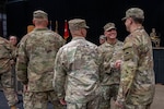 Brig. Gen. Alan R. Gronewold, the Adjutant General, Oregon, shakes hands with Soldiers of the 41st Infantry Brigade Combat Team (IBCT) during their demobilization ceremony at the Salem Armory Auditorium, September 6, 2025, in Salem, Ore. The 41st IBCT returned home from a year-long deployment to Kosovo as part of the NATO-led Kosovo Force (KFOR) mission.