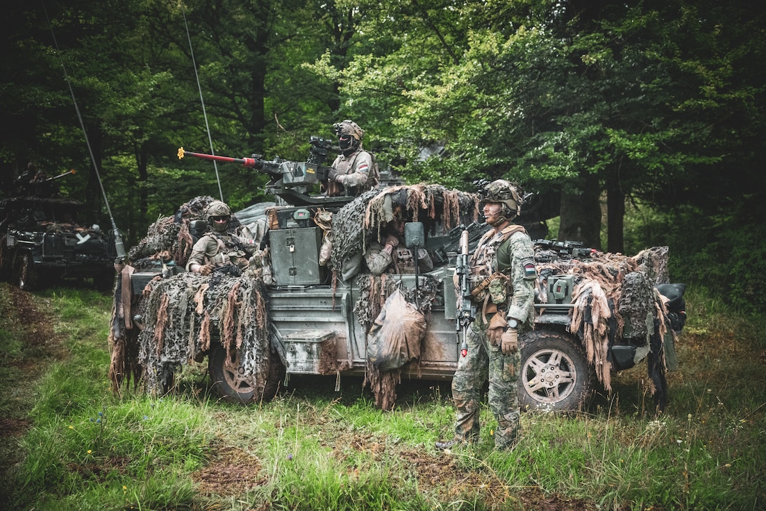 Dutch soldiers assigned to the 17th Light Armored BN scan the area during Saber Junction 25 at the Hohenfels Training Area, Joint Multinational Readiness Center, Germany, September. 4, 2025.
