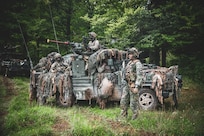 Dutch soldiers assigned to the 17th Light Armored BN scan the area during Saber Junction 25 at the Hohenfels Training Area, Joint Multinational Readiness Center, Germany, September. 4, 2025.