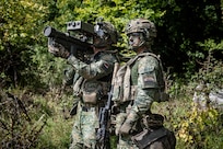 Dutch soldiers assigned to the 17th Light Armored BN utilize a stinger in a simulated training exercise during Saber Junction 25 at the Hohenfels Training Area, Joint Multinational Readiness Center, Germany, September. 4, 2025