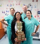 Sherilyn Long (front left), the 2026 Mana’olana Nurse of Hope Award recipient, is pictured with colleagues Abigail Troncoso, RN, Joshua Thompson, RN and Jennifer Peralta, RN, at Tripler Army Medical Center. Long was recognized for her dedication to patient care and compassionate approach to oncology nursing by the Oncology Nursing Society Hawaii chapter. (Defense Health Agency photo by Hugh Fleming)
