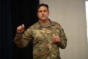 Col. Joe Wall, 22nd Air Refueling Wing commander, speaks at an all-call at McConnell Air Force Base, Kansas, Sept. 4, 2025. Wall defined his priorities and goals for the wing during his first all-call. (U.S. Air Force photo by A1C Patrick O'Neill)