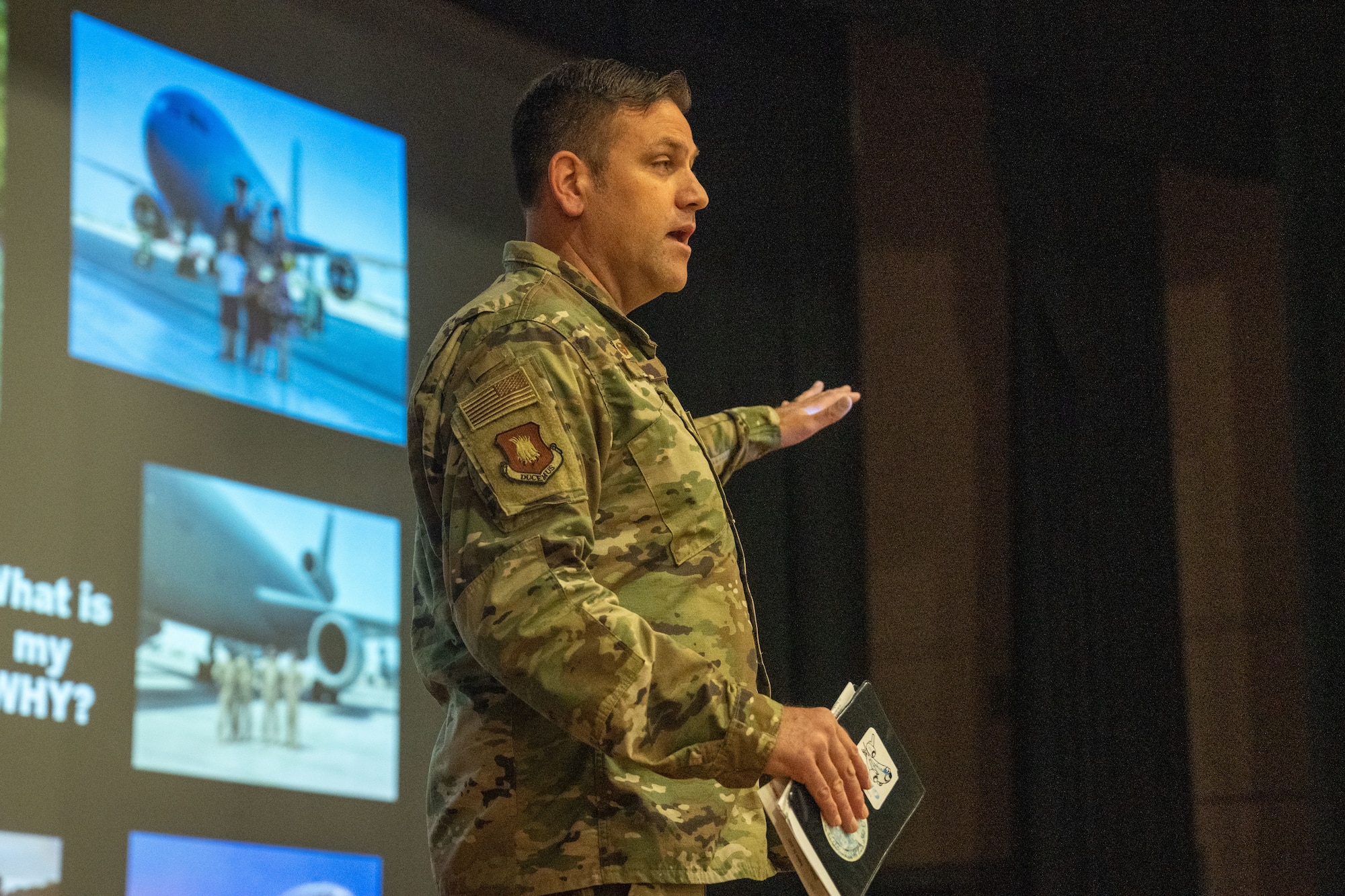 Col. Joe Wall, 22nd Air Refueling Wing commander, hosts an all call at McConnell Air Force Base, Kansas, Sept. 4, 2025. Wall hosted his first all-call alongside Chief Master Sgt. Markiesha Crawford, 22nd ARW command chief. (U.S. Air Force photo by Senior Airman Felicia Przydzial)