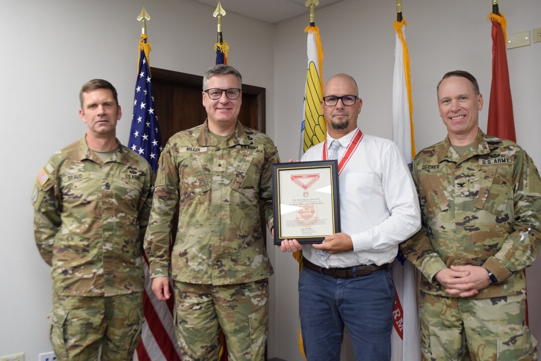Brig. Gen. Miller presents the distinguish U.S. ARMY ENGINEER ASSOCIATION BRONZE ORDER OF THE DE FLEURY MEDAL