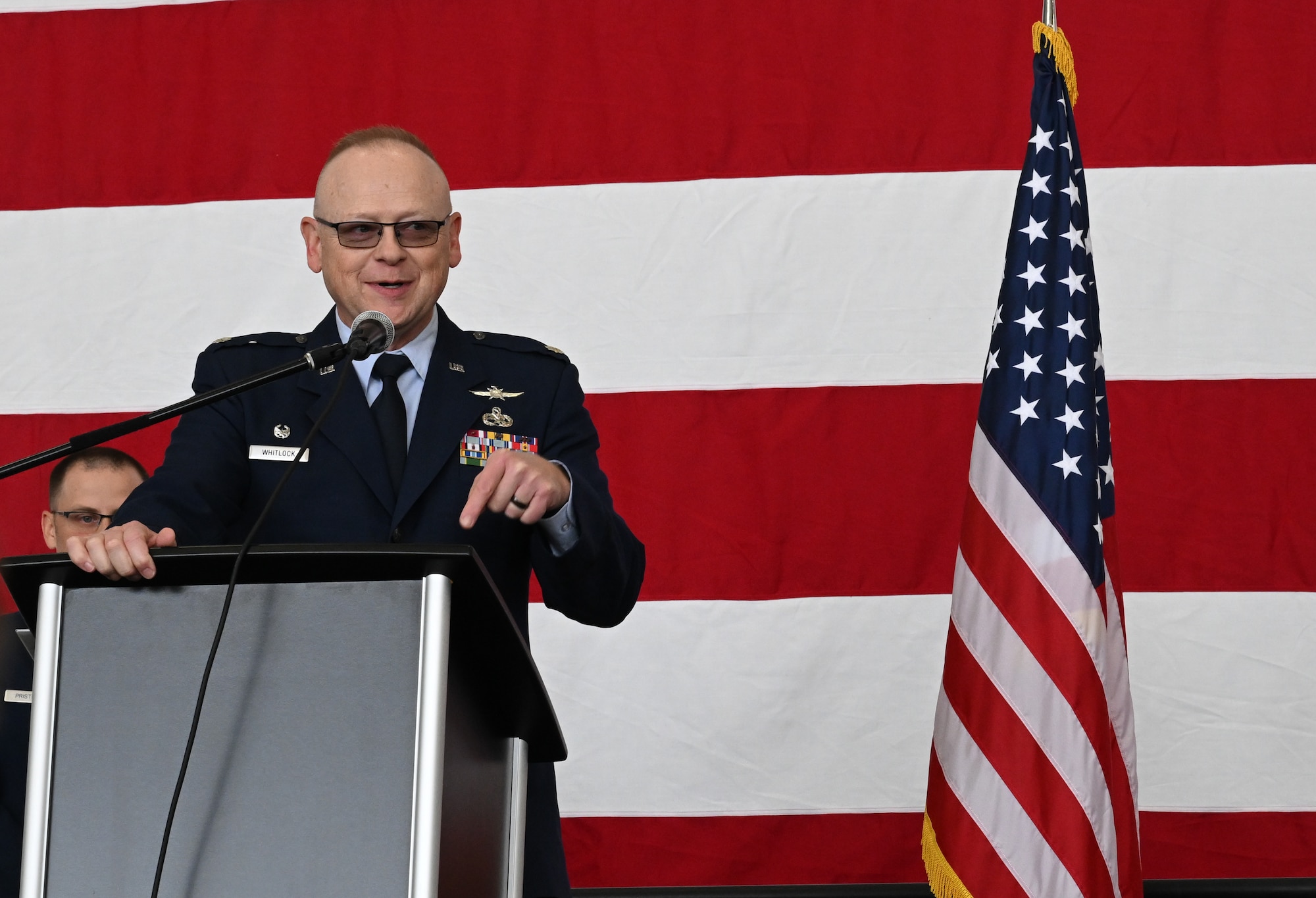 Lt. Col. Russell Whitlock, 910th Force Support Squadron commander, speaks during the retirement ceremony of Chief Master Sgt. Robert Fisher, 910th Communications Squadron senior enlisted leader at Youngstown Air Reserve Station, Ohio, Sept. 6, 2025.