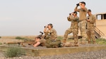 Sgt. Alex Beglau and Sgt. Geoffrey Machado, both assigned to 2nd Battalion, 162nd Infantry Regiment, engage targets while Sgt. 1st Class Andrew Graham, Staff Sgt. Michael Kissee and Staff Sgt. Tyrone Morris spot and score from behind at Boardman Training Area, Ore., Sept. 5, 2025. The range officers evaluated competitor performance during the inaugural Oregon State Sniper Qualifier.