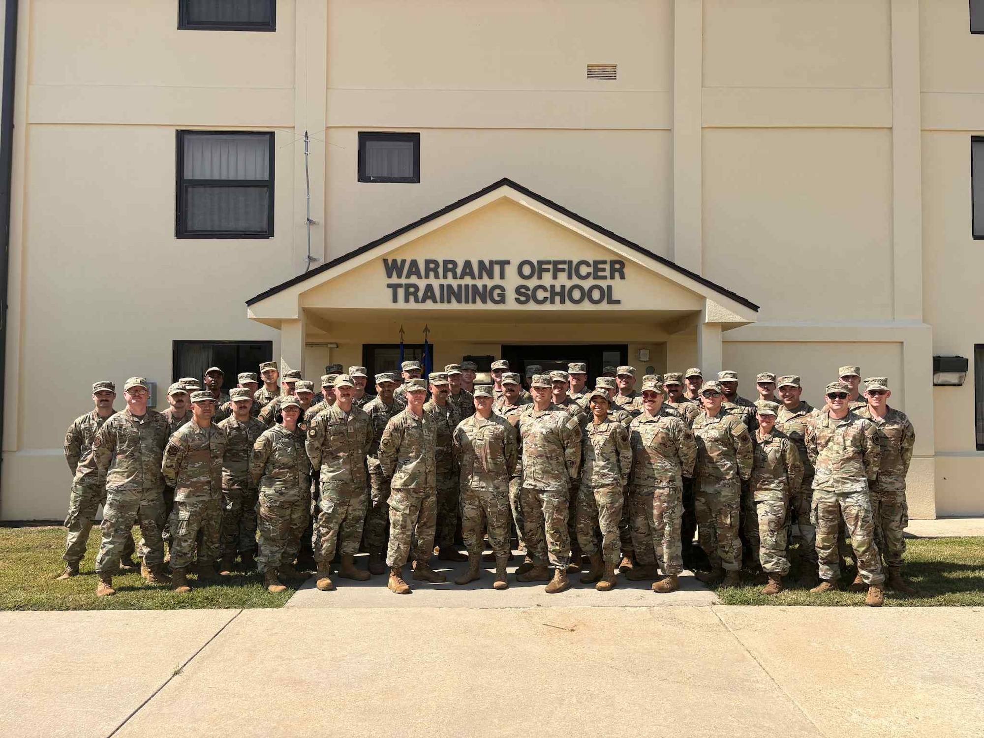 Warrant Officer Training School class 26-01 stands for a photo during the school’s first Warrant Officer Summit since its reestablishment at Maxwell Air Force Base, Ala. August 28, 2025. (U.S. Air Force photo by Captain Rachael Parks)