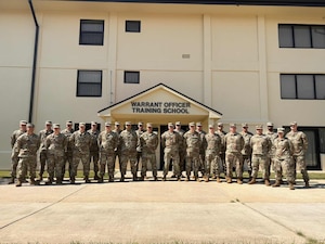 Warrant Officer Training School class 26-01 stands for a photo during the school’s first Warrant Officer Summit since its reestablishment at Maxwell Air Force Base, Ala. August 28, 2025. (U.S. Air Force photo by Captain Rachael Parks)