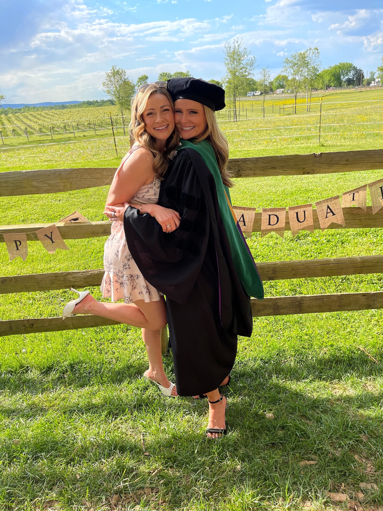 Two sisters pose for a photo