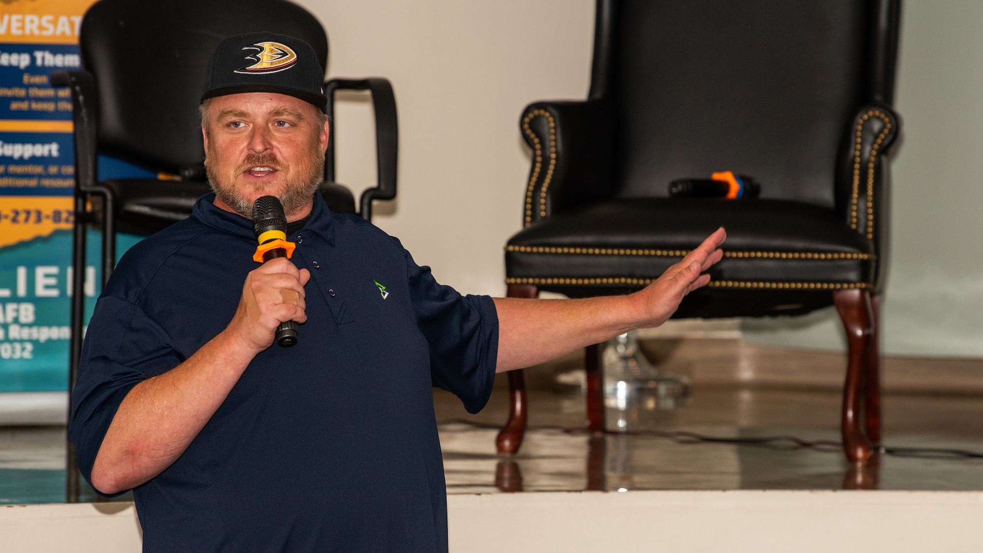 Comedian performs during comedy session