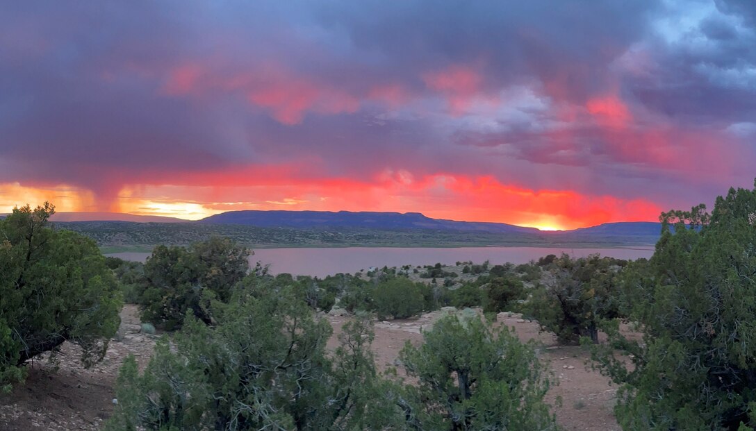 Smoke from the Indios Fire and a passing rainstorm make for the most amazing sunset colors, July 11, 2024, - no filter needed. The photo was taken at the volunteer site in the Riana Campground at Abiquiu Lake, N.M., by Pamela Bowie.