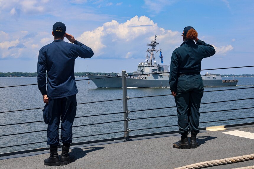 (July 18, 2025) Operations Specialist 2nd Class Aaron Diaz (left) and Boatswain’s Mate 3rd Class Sanaa Cooks (right) assigned to the Arleigh Burke-class guided-missile destroyer USS Bulkeley (DDG 84) pass honors and salute the USS Thomas Hudner (DDG 116) during a sea-and-anchor detail. USS Bulkeley is on a scheduled deployment in the U.S. 6th Fleet area of operations to support the warfighting effectiveness, lethality and readiness of U.S. Naval Forces Europe-Africa, and defend U.S., Allied and partner interests in the region. (U.S. Navy photo by Mass Communication Specialist 2nd Class Jonathan Nye)