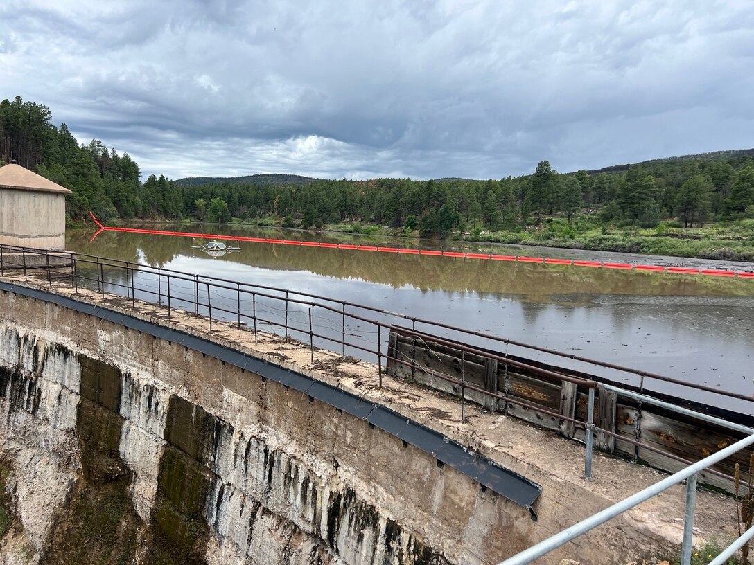 Debris runoff from the July 2024 Las Vegas, N.M., storm event is seen in Peterson Reservoir in this photo taken during an inspection of the dam and reservoir, June 23, 2024.