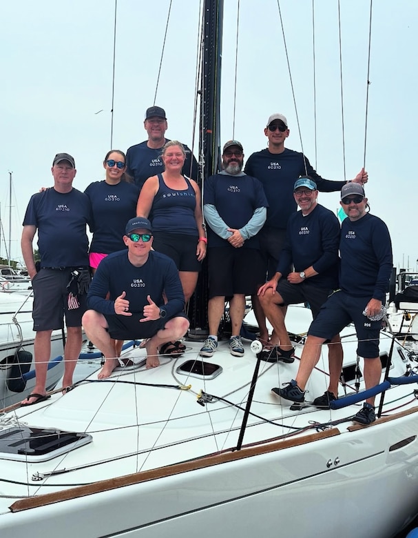 Large group on small sailboat