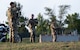 Airmen from the 5th Security Forces guide traffic through the Magic City Gate during a simulated demonstration at Minot Air Force Base, North Dakota, Sept. 3, 2025. The simulated demonstration was a part of Warbird Week, a routine exercise that ensures Airmen remain prepared to protect Minot AFB assets and respond to real-world incidents.