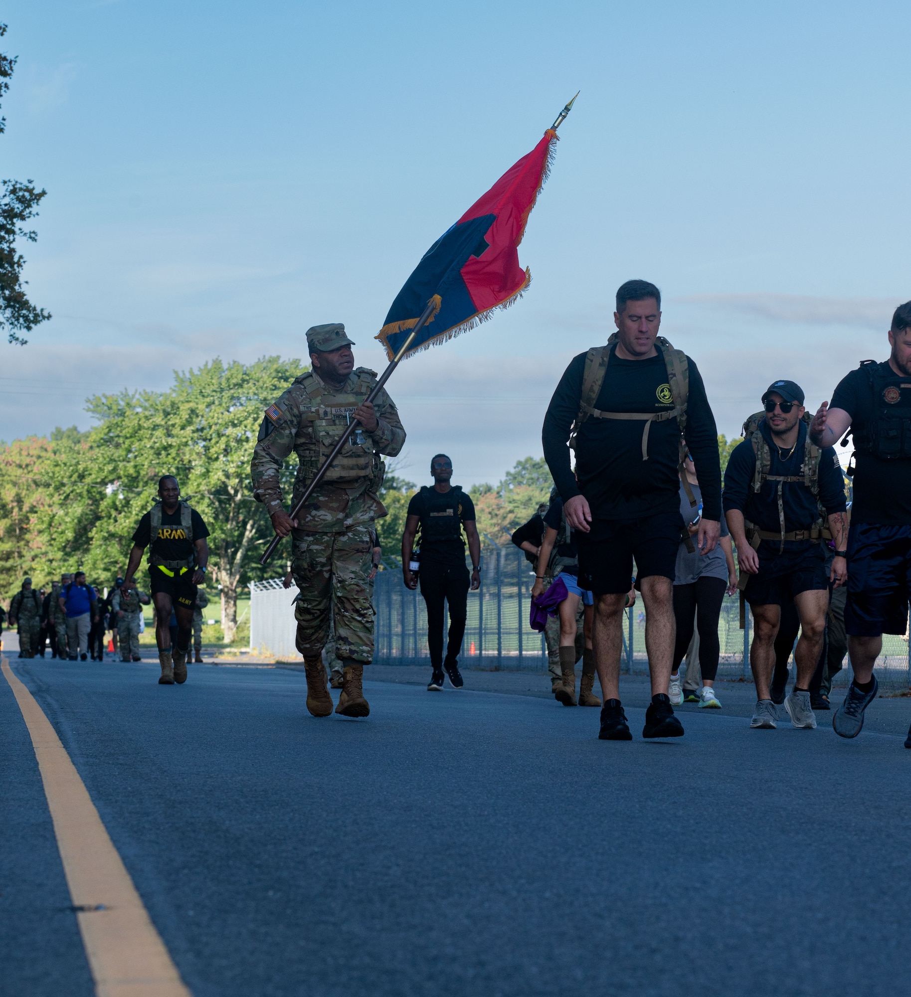 U.S. service members from multiple branches participate in the “Be the Anchor” ruck march Sept. 3, 2025, at Joint Base McGuire-Dix-Lakehurst, N.J. Service members and Department of Defense civilians took part in the 5k ruck march or 3k walk for suicide awareness.