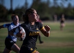 Army 1st Lt. Naomi Colin sprints past Air Force Master Sgt. Sahtara Wehe during Army's 15-14 triumph in the 2025 Armed Forces Women's Rugby Championship game Sept. 7 in Chula Vista, Ca. (Dept. of War Photo by PO1 Colby Mothershead, released)