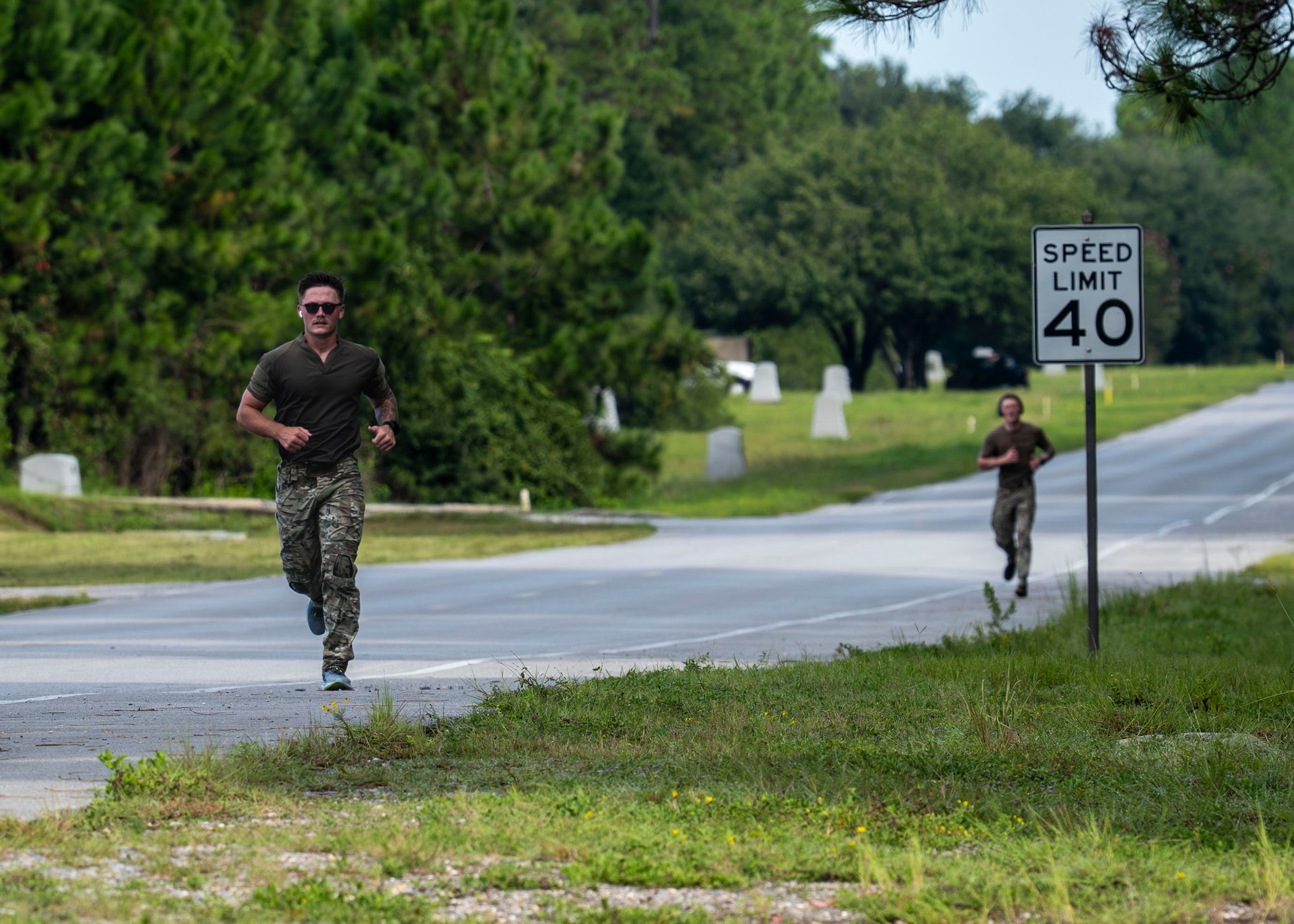 U.S. Airmen assigned to the 1st Special Operations Wing perform a ruck-run at Hurlburt Field, Florida