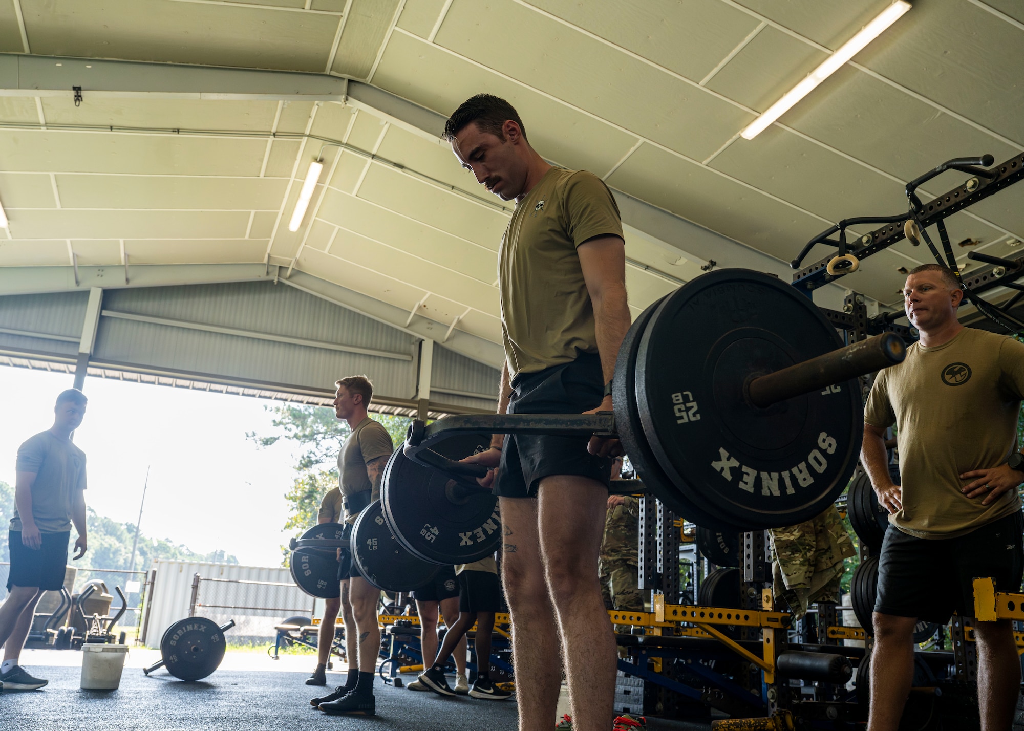 U.S. Airmen assigned to the 1st Special Operations Wing perform deadlifts at Hurlburt Field