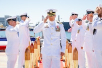 NAVAL BASE POINT LOMA (Aug. 29, 2025) Capt. Phillip Sylvia Jr. passes through sideboys during a Commander, Submarine Squadron (CSS) 11 change of command ceremony held aboard Los Angeles-class fast-attack submarine USS Scranton (SSN 756) at Naval Base Point Loma, Aug. 29, 2025. During the ceremony, Silvia relieved Capt. Will Wiley as the new commander for CSS-11. CSS-11 is home to four Los Angeles-class fast-attack submarines, capable of supporting various missions, including anti-submarine warfare, anti-ship warfare, strike warfare and intelligence, surveillance and reconnaissance. (U.S. Navy photo by Mass Communication Specialist 1st Class Aaron T. Smith)