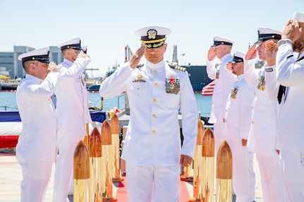 NAVAL BASE POINT LOMA (Aug. 29, 2025) Capt. Phillip Sylvia Jr. passes through sideboys during a Commander, Submarine Squadron (CSS) 11 change of command ceremony held aboard Los Angeles-class fast-attack submarine USS Scranton (SSN 756) at Naval Base Point Loma, Aug. 29, 2025. During the ceremony, Silvia relieved Capt. Will Wiley as the new commander for CSS-11. CSS-11 is home to four Los Angeles-class fast-attack submarines, capable of supporting various missions, including anti-submarine warfare, anti-ship warfare, strike warfare and intelligence, surveillance and reconnaissance. (U.S. Navy photo by Mass Communication Specialist 1st Class Aaron T. Smith)