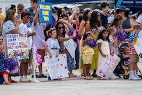 NAVAL BASE GUAM (August 31, 2025) Families of Sailors wait as the Los Angeles-class fast-attack submarine USS Springfield (SSN 761) moors at Naval Base Guam returning to its homeport after completing a routine deployment in the Indo-Pacific, August 31, 2025. Assigned to Commander, Submarine Squadron 15, based at Polaris Point, Naval Base Guam, Springfield is one of five forward-deployed fast-attack submarines. Renowned for their unparalleled speed, endurance, stealth, and mobility, fast-attack submarines are the backbone of the Navy’s submarine force. Regarded as apex predators of the sea, Guam’s fast-attack submarines serve at the tip of the spear, helping to reaffirm the submarine force's forward-deployed presence in support of a free and open Indo-Pacific. (U.S. Navy photo by Lt. James Caliva)