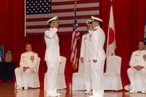 Capt. Louis Catalina, right, relieves Capt. Nicholas DeLeo, left, as commanding officer of the U.S. 7th Fleet flagship USS Blue Ridge (LCC 19) during the Blue Ridge change of command ceremony at Commander, Fleet Activities Yokosuka, Sept. 5, 2025