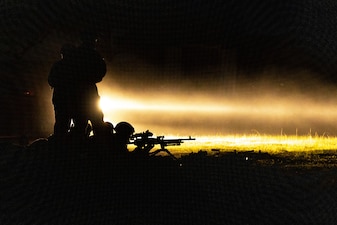 U.S. Marines with III Marine Expeditionary Force Support Battalion (MSB), III MEF Information Group, fire an M240B machine gun during a live-fire range at Camp Hansen, Okinawa, Japan, Aug. 20, 2025.